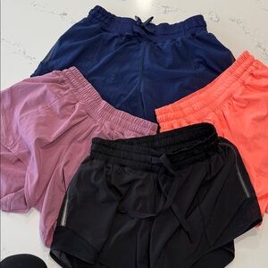 4 pairs of Lululemon Women's  Athletic Shorts.